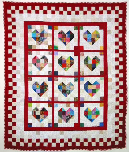 Click here to download Scrappy Heart Quilt free quilt pattern (.pdf file)